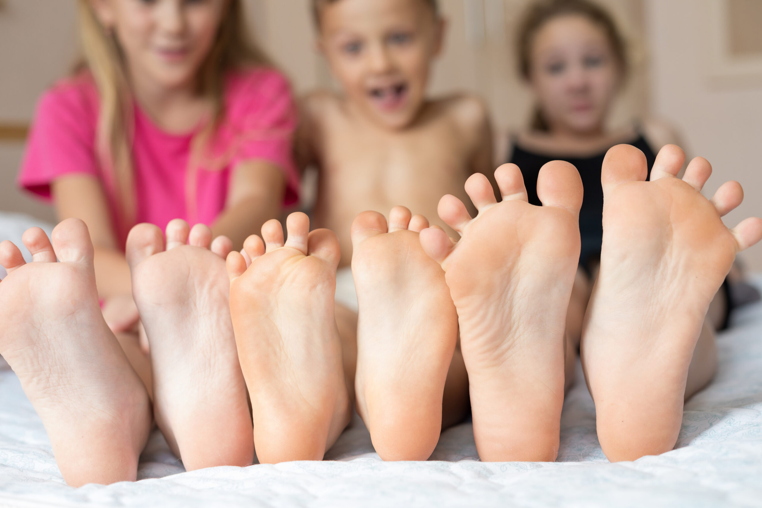 Children receiving kid-friendly pedicure services